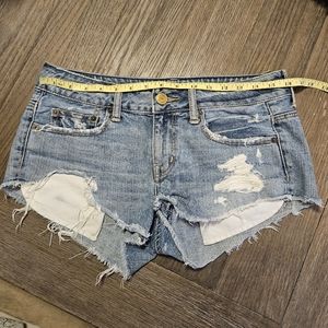 American Eagle distressed jean shorts size 4